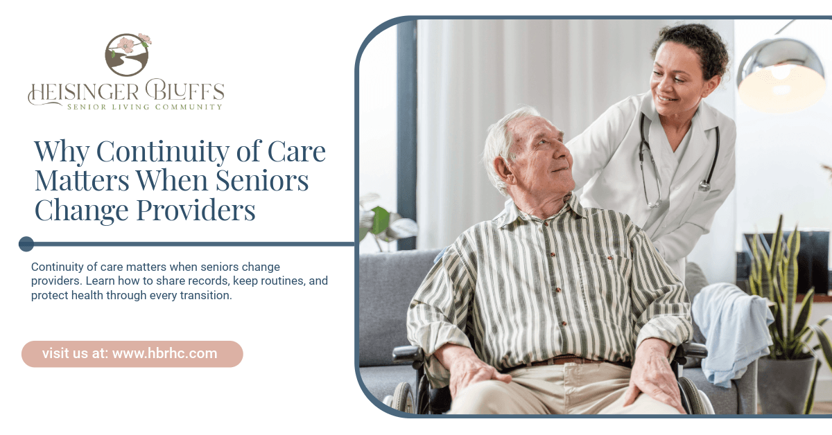 A caregiver talking to an elderly man sitting in a wheelchair